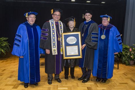 Congratulating Mrs. Jacqueline McEntire on receiving her honorary degree from Southeastern are Regent John Massey, Chair of the Oklahoma State Regents for Higher Education; Southeastern president Sean Burrage; Regent Lake Carpenter, Chair of the Regional University System of Oklahoma Board of Regents; and Chancellor Glen D. Johnson.