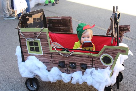 Baby dressed as Peter Pan in DIY boat won 1st place at 22nd Annual Pumpkin Festival costume contest in Paris, TX.