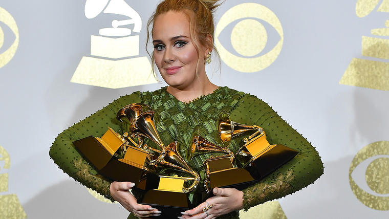 Adele+poses+with+her+five+Grammy+awards+from+the+2017+ceremony.+Photo+courtesy+of+www.mtv.co.uk.