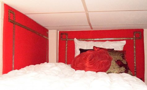 This DIY headboard helps cover empty space and adds a personalized touch. All you need is a cardboard box, fabric, cotton, super glue and ribbon.
