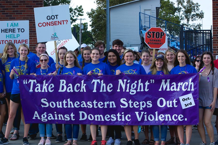 Southeastern students gather in front of the Paul Laird Field for the Take Back the Night march on Monday, Oct. 2.