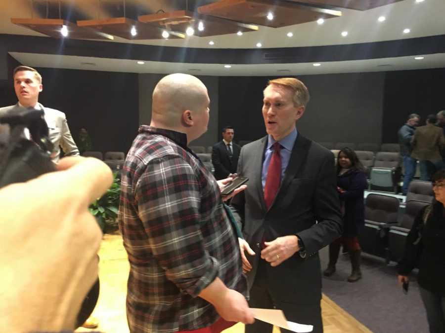 Brad Erwin, left, takes the opportunity to talk directly with the senator during his visit to Southeastern February 21. 