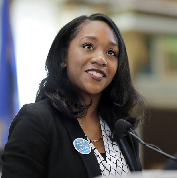 Erica Stephens, a senior attending Oklahoma State University, speaks during the Higher Education Day event on Tuesday, Feb. 13, 2018. Stephens, from Oklahoma City, is majoring strategic communications and political science. Students from Oklahoma’s colleges and universities occupy  the chairs of legislators as they gather on the floor of the House chamber to hear speeches by state officials and fellow students who had come to the state Capitol to publicly promote the value and importance of higher education during 2018 Higher Education Day activities at the Capitol. Photo by Jim Beckel, The Oklahoman