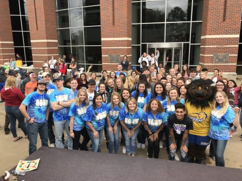 Savage Storm Leaders pose after a long day of interacting with close to 1,500 high school students.
