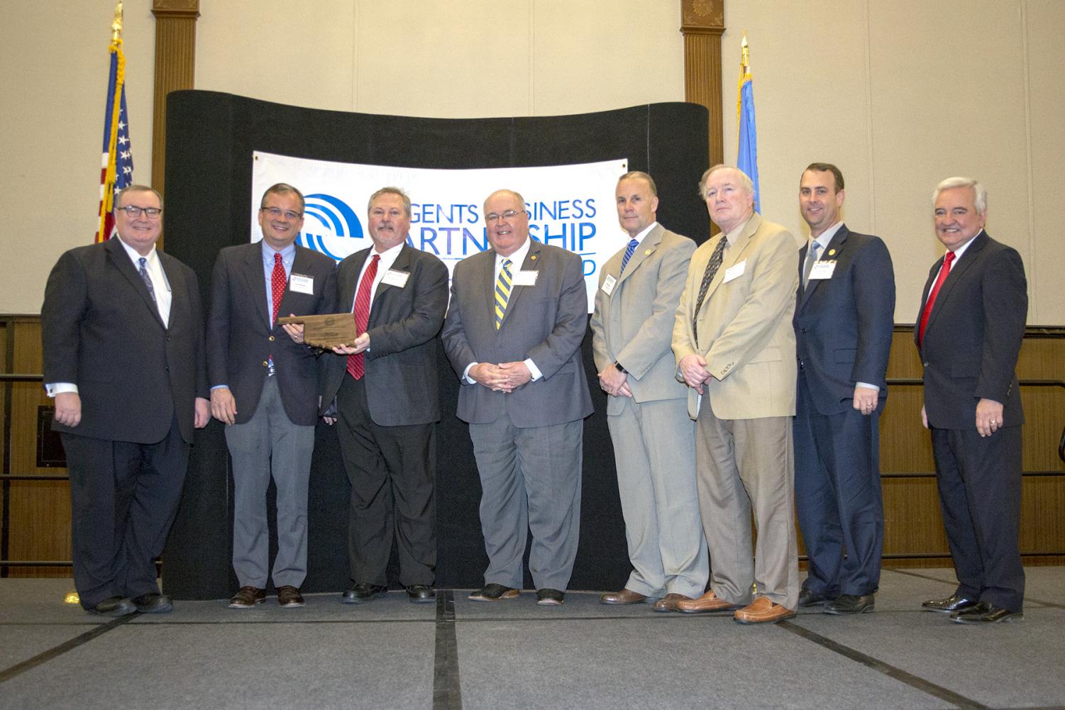 Attending the Partnership Excellence Award presentation were Chancellor Glen D. Johnson, Southeastern president Sean Burrage, BrucePac general manager Bob Delveaux, former Durant Industrial Authority executive director Tommy Kramer, Southeastern athletic director Keith Baxter, Southeastern director of university communications Alan Burton, Southeastern vice president for advancement Dr. Kyle Stafford, and Oklahoma Secretary of State, Education and Workforce Development Dave Lopez.
