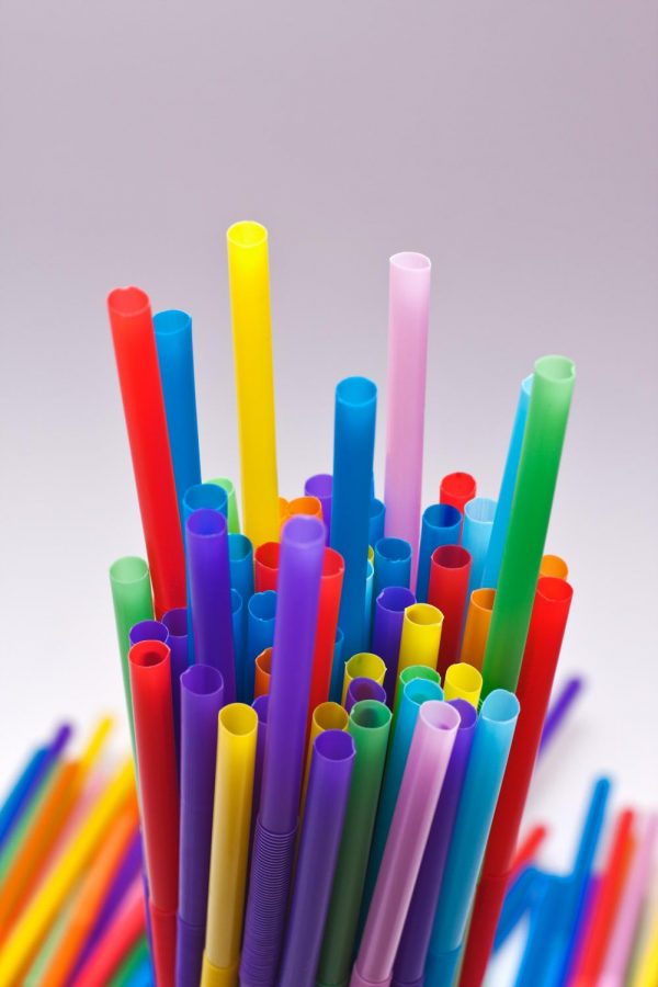 Lots of colorful plastic straws with flexible bodies stuck together in a glass.
https://creativecommons.org/licenses/by/2.0/deed.en