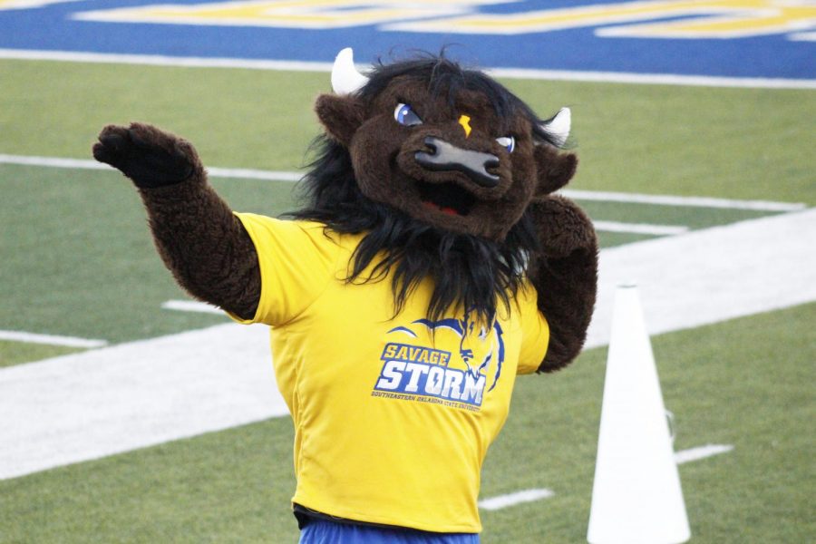 Bolt hosts a gun show for the stands on the sidelines of the first home football game of the season.