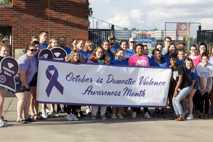 Over 50 students participated in this years Tale Back the Night walk for domestic violence awareness and attended the candle light vigil held at Market Square.