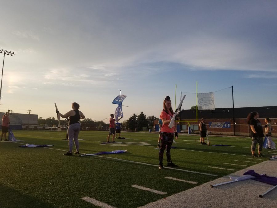 The Southeastern Band and Color Guard wakes up before the sun to begin morning practice every weekday from 7:30 a.m. to 9 a.m. Guard Members featured from left to right: Trey Wier, Lydia Finch, Nicholas Herfurth, Dalton Amiott, Destiny LaRue, Wesley Ridenhour, Katie Hester and Katie Thomas.