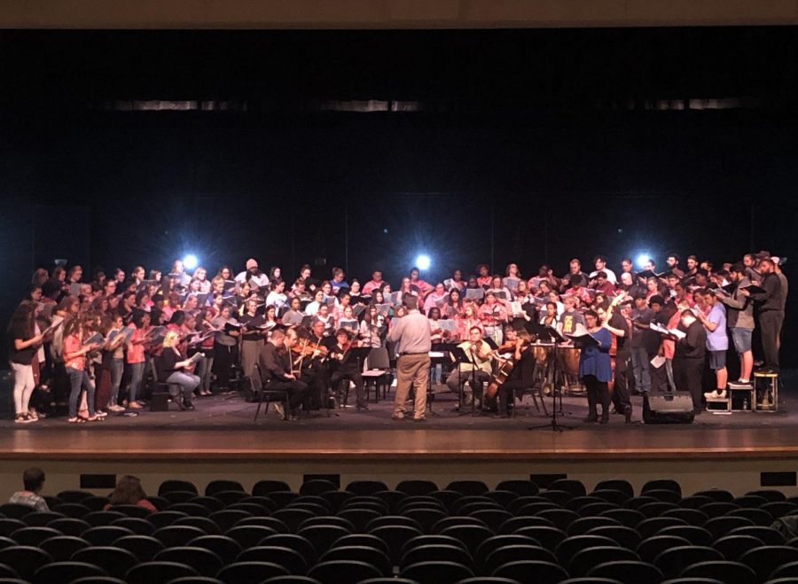 Choctaw High School, Del City High School and Rose State College join Southeastern Oklahoma State University on stage in rehearsal for the Oklahoma Classical Festival.