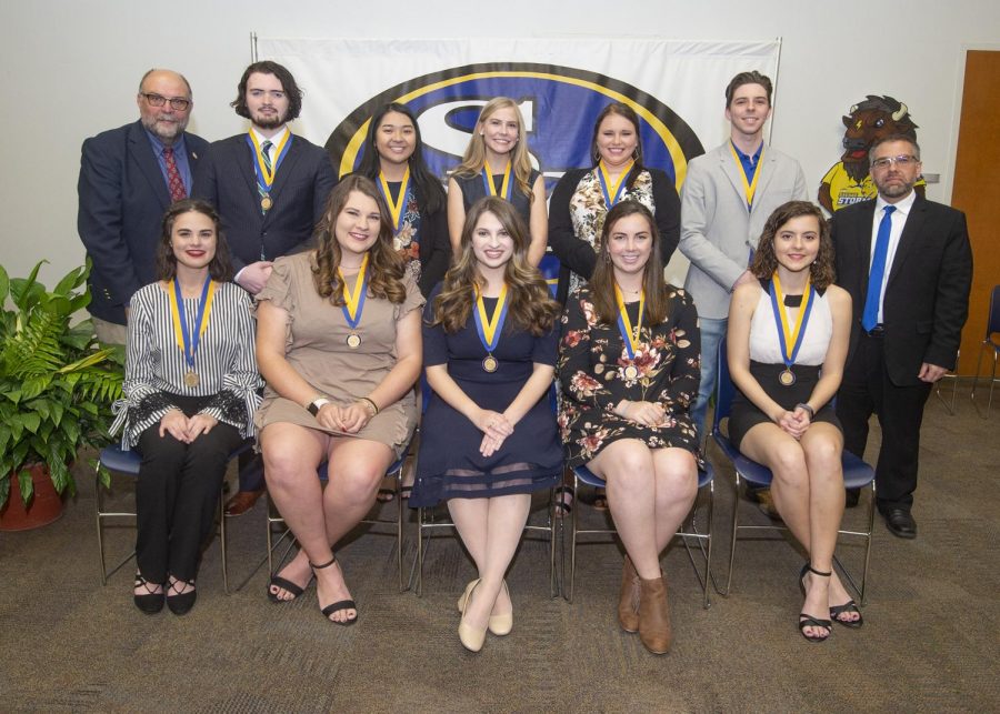 Front row, left to right, are Katie Thomas, Carli Wharton, Anna Alessia Antuono, Madelyn Bradberry, and Reagan Benson. Back row, Dr. Bryon Clark, Selby Stanton, Tammy Vo, Emily Dahl, Maegan Young, James Quarles, and Dr. Marlin Blankenship.