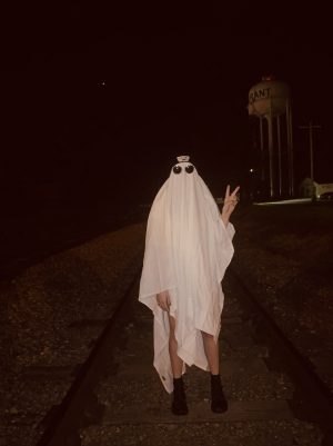 Ghost Photoshoot' TikTok Trend Draws Criticism, Comparison to KKK