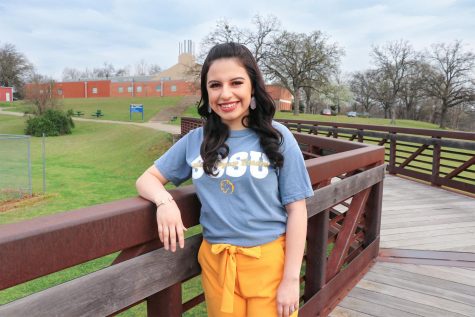 Yoselin Rodriguez-Diaz poses in front of the Biology Building where she spends most of her time working towards a career as a physician’s assistant