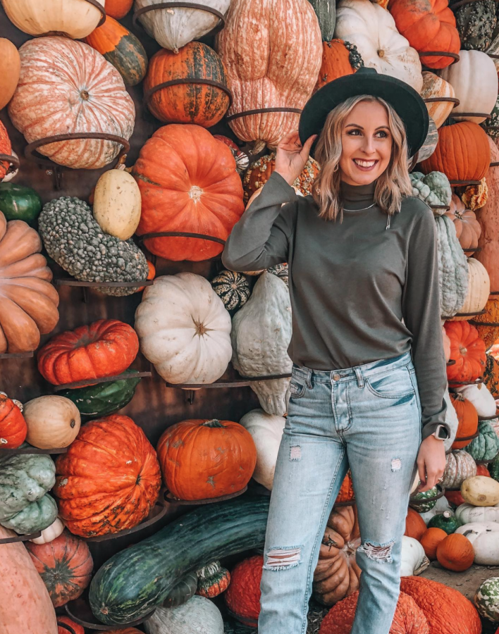 Madelyn Haines, an SE alumna, poses for a photo while enjoying time with family at the Dallas Arboretum and Botanical Garden on Sept. 28, 2020.