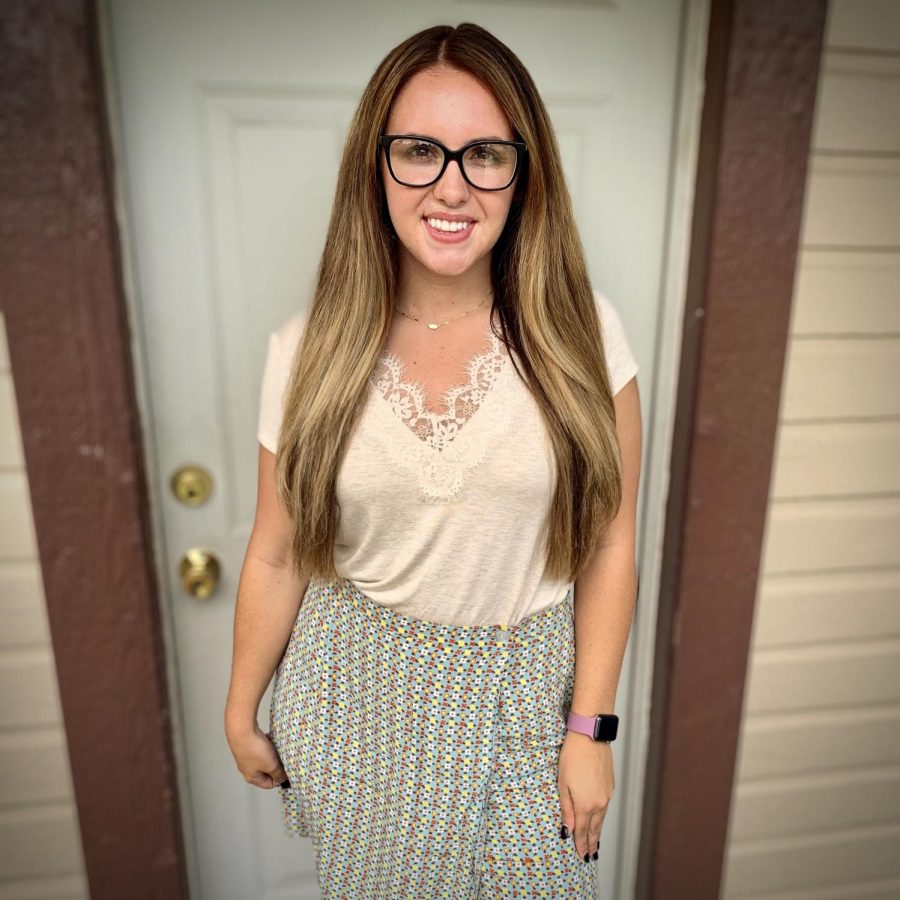 Adelina Duty poses for a photo on her first day of her senior year. She is looking forward to seeing where she goes after graduation.