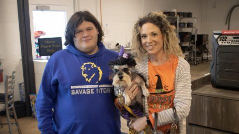 Southeastern Oklahoma State Universitys very own Alisha Ridenour, Assistant Director/Instructional Designer for CIDT and her son Lexton Ridenour, a student, with their witchy pup.